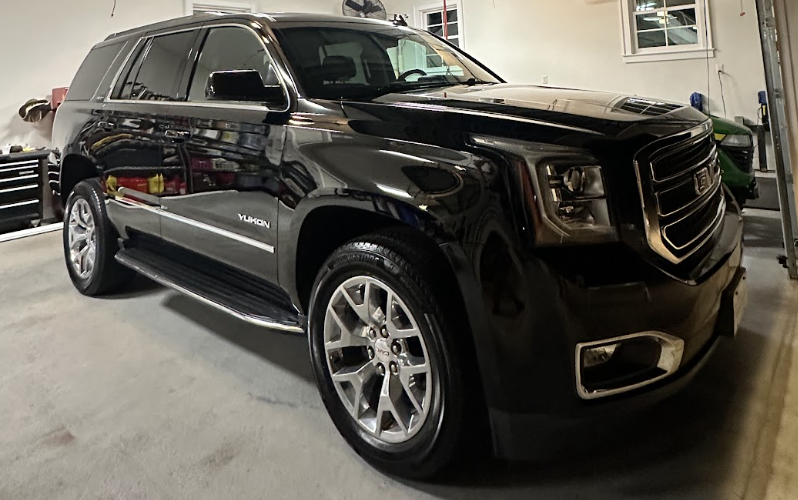 Black SUV with high-gloss ceramic-protected paint
